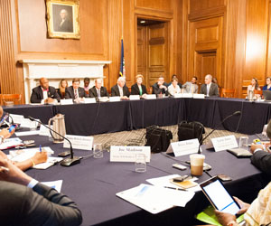 In a "meet the press" type setting, U. S. senators - between votes - fielded questions from reporters during a Black media roundtable.