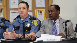 Lt. Steve Strand of SPD's South Precinct, left, and Interim Seattle Police Chief Harry Bailey, right, respond to questions from citizens about safety issues in South Seattle. Staff Photo/Chris B. Bennett.