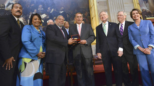 (L-R) Dexter Scott King, Bernice King and Lonnie Bunch III accept the Congressional Gold Medal from Rep. John Boehner (R-Ohio), Sen. Harry Reid (D-Nev.), Sen. Mitch McConnell (R-Ky.) and Rep. Nancy Pelosi (D-Calif.). Photo/Freddie Allen/NNPA
