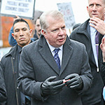 Seattle Mayor Ed Murray participates in a march organized by the United Black Christian Clergy protesting the grand jury decision in Ferguson. Photo/Chris B. Bennett