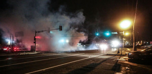ear gas in Ferguson. Photo/Lawrence Bryant / St. Louis American.