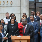 National Bar Association President Benjamin Crump (at mic) and Stephanie Myers, National Co-chair of Black Women for Positive Change announce National Week of Non-violence. Photo/Roy Lewis/Trice Edney News Wire.