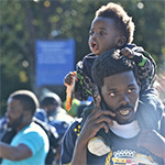 Individuals, organizations as well as families with children came to participate in the "Justice or Else" gathering. But, the messages they took away varied. Photo/Travis Riddick/Trice Edney News Wire.