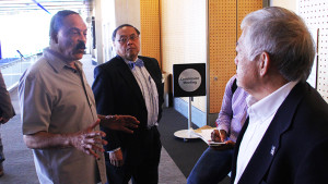 Eddie Rye, Jr., left, talks to members of the Washington State Civil Rights Coalition  about their leasing  concerns at the Port of Seattle. Photo/Aaron Allen.