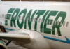 Frontier Passenger Chokes Off-Duty Flight Attendant After Trying To Open Exit Door And Cockpit On Chicago Flight, Police Say