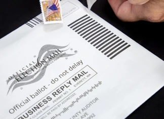 Washington Sues To Block New USPS Ballot Rules Weeks Ahead Of Midterm Elections